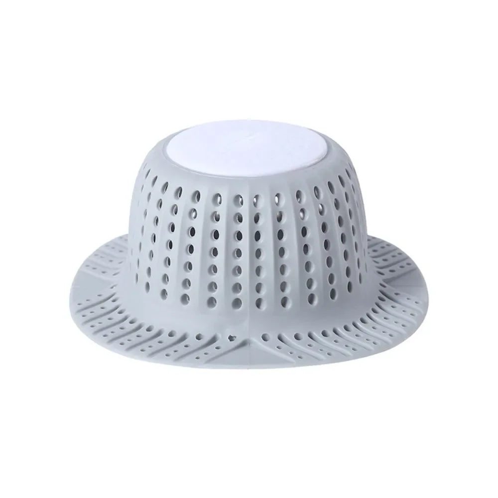 White collapsible silicone drain hair catcher for bathtubs and sinks