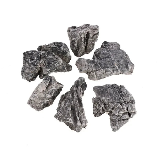 A collection of irregularly shaped natural grey aquarium stones for aquascaping and fish tank decoration.