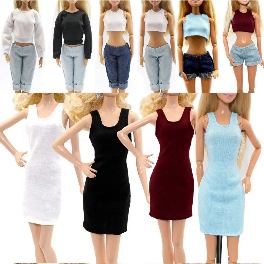 A collection of fashion doll clothing sets featuring various styles and colors including tops, bottoms, and dresses.