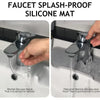 A silicone mat designed to prevent water splash and keep the countertop clean, shown in use near a faucet.