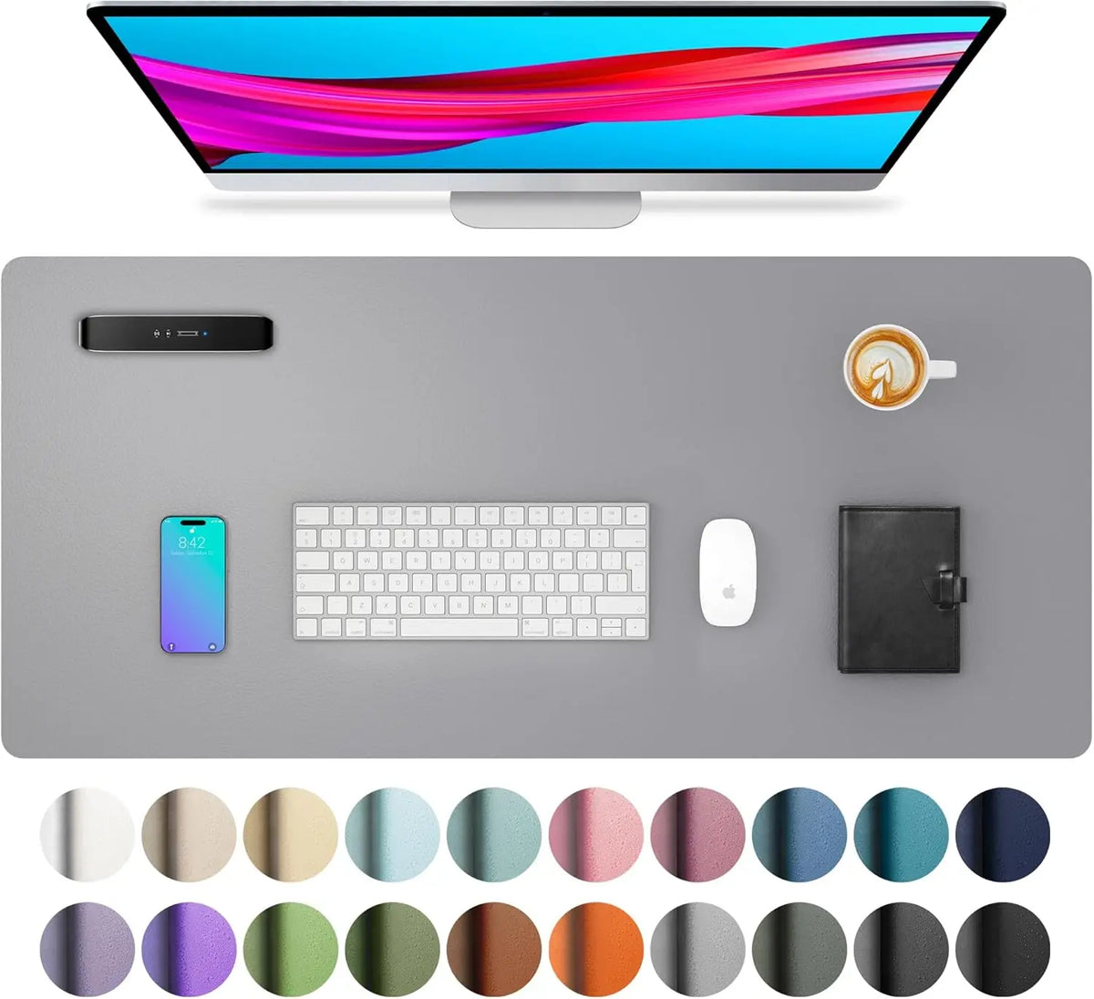 A computer monitor, a smartphone, a keyboard, a mouse, and various colored circles are displayed on a gray desk pad.