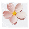 Pink magnetic flower shaped clips used for sealing bags