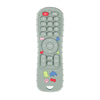 A light green silicone baby teether toy shaped like a TV remote control with buttons and features.