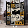 A black and gold patterned flannel throw blanket featuring cat-themed sayings for bed or sofa.