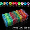 A set of 100 transparent acrylic D6 dice in various colors and patterns arranged in rows.
