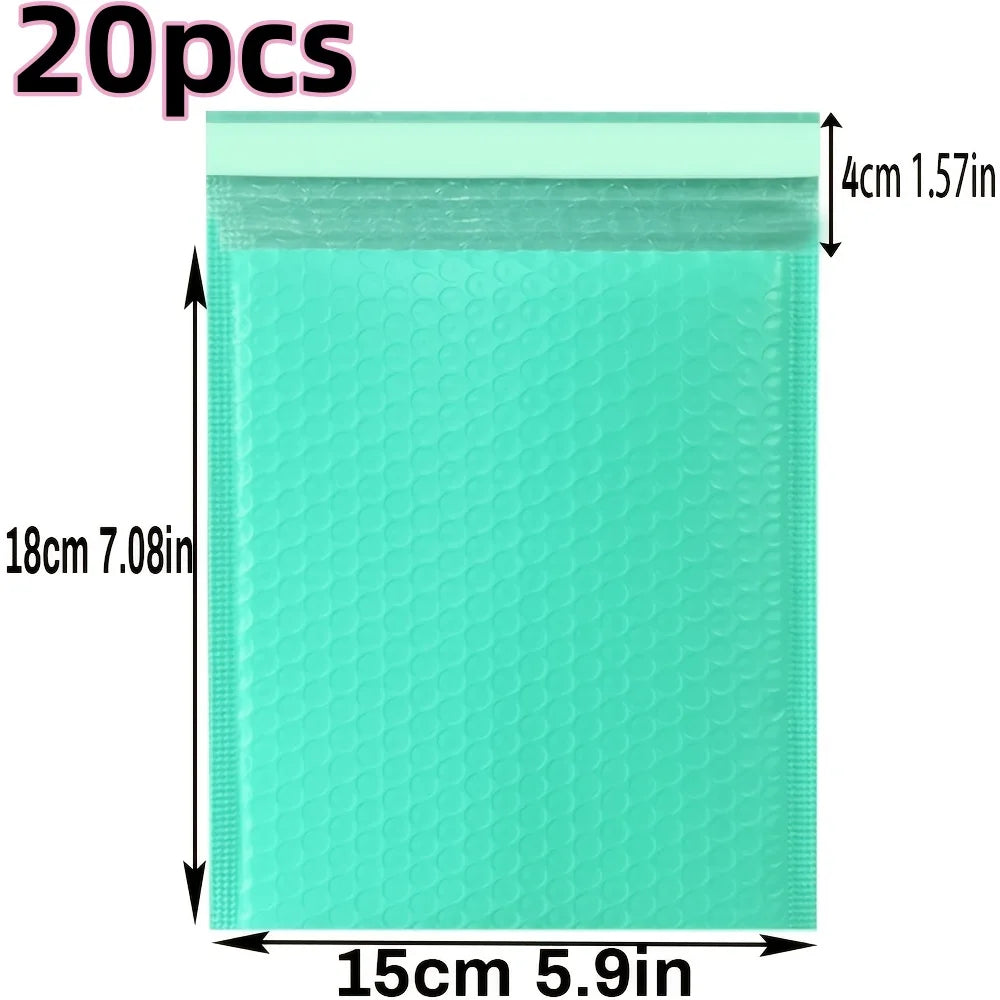 A rectangular teal padded bubble mailer with dimensions 15cm x 18cm and a thickness of 4cm.