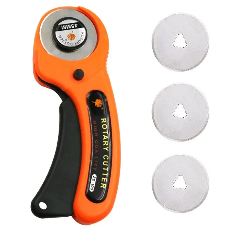 Orange rotary cutter sewing kit with cutting mat, ruler, and spare blades