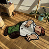 A playful cartoon carpet featuring a stylized figure lying down on a wooden floor.