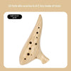 A light wood grain 12-hole alto ocarina in A key made of resin.