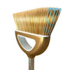 A close-up view of a golden broom with four bristles and a handle.