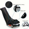 A black heavy-duty outdoor push mower cover showing features like a silver-plated back-coating, elastic hem, and buckle strap