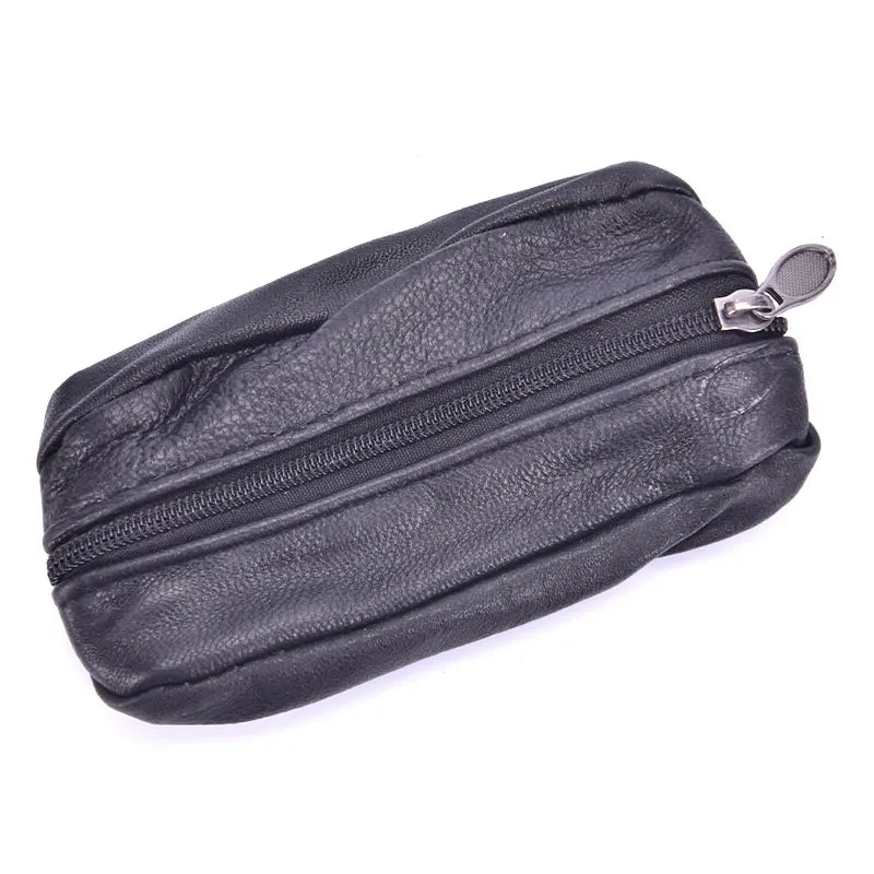 A black leather compact zippered coin purse with a metal key holder attached.