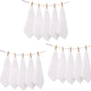 A set of white soft cotton terry cloth face towels hanging on a line.