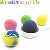 Colorful air dry clay balls of various colors including green, yellow, and blue on a white background