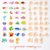 A collection of wooden magnetic fishing toys featuring various marine animals like fish, dolphins, and sea creatures.