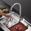 A kitchen faucet is shown with a rotating adapter and multiple flow settings over a sink, next to fresh produce.
