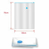 A white vacuum storage bag with a valve, shown next to its dimensions.