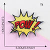 Yellow embroidered lettering patch with the word POW in red and white, featuring a starburst shape.