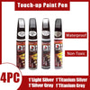 Four touch-up paint pens in various silver and gray colors for car paint repair