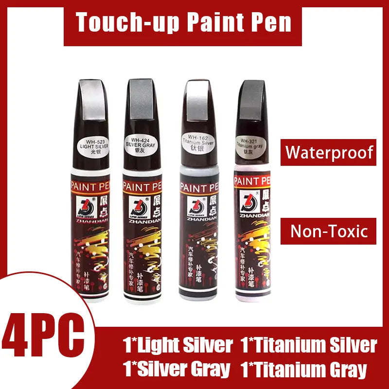 Four touch-up paint pens in various silver and gray colors for car paint repair