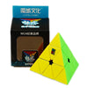 A yellow and green geometric speed cube product box and disassembled cube.