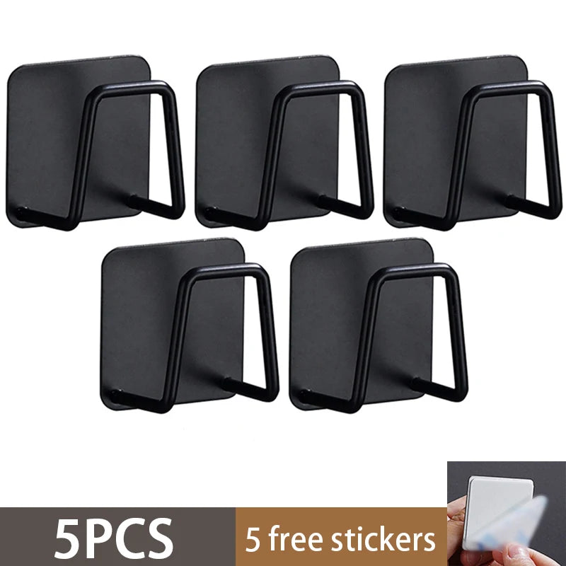 Five black stainless steel sponge holders or kitchen sink racks shown individually.