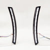 Pair of black LED daytime running lights for a Honda CR-V with dynamic turn signal.