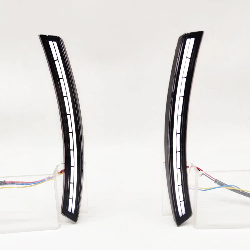 Pair of black LED daytime running lights for a Honda CR-V with dynamic turn signal.