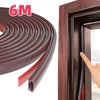 Roll of maroon self-adhesive D-shape weather stripping used for sealing doors and windows.