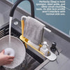 A close-up of an adjustable sink sponge holder with a drainer basket and a flexible faucet in a kitchen sink.