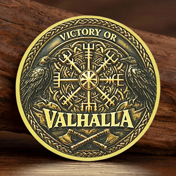 Gold-plated collectible coin featuring a Viking design with the text Victory or Valhalla surrounded by Norse symbols.