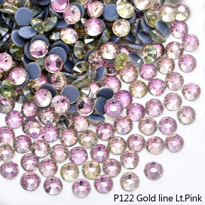 P122 Gold line Lt.Pink rhinestones in various shades of pink and green.