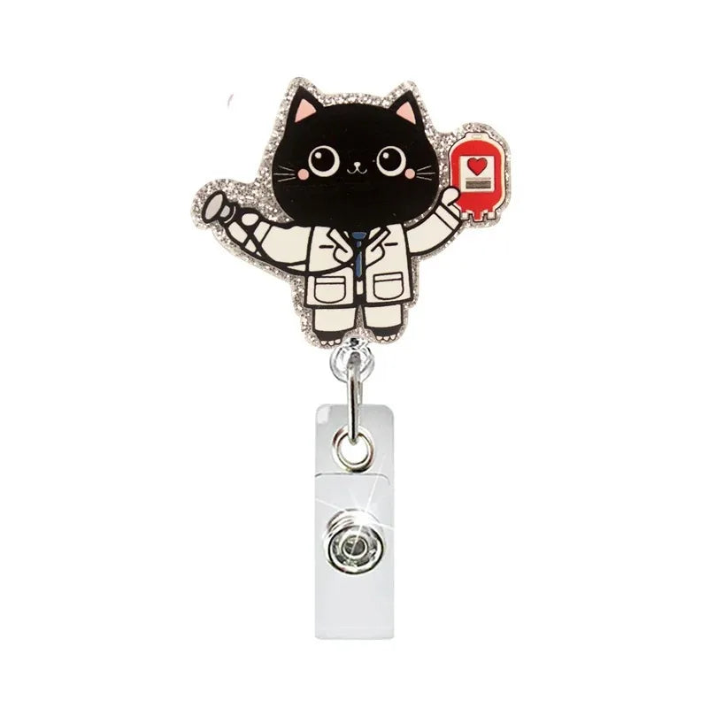 A glitter acrylic badge reel featuring a black cat design with a red heart emblem.