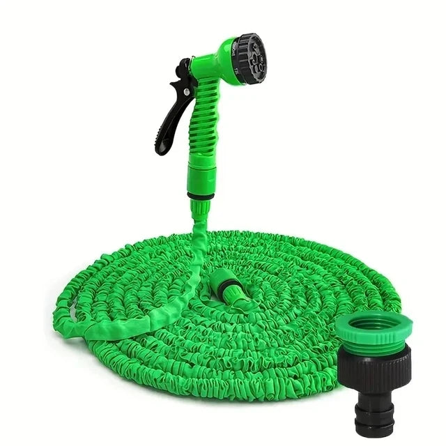 A bright green expandable garden hose with a nozzle and a circular spray head is shown.
