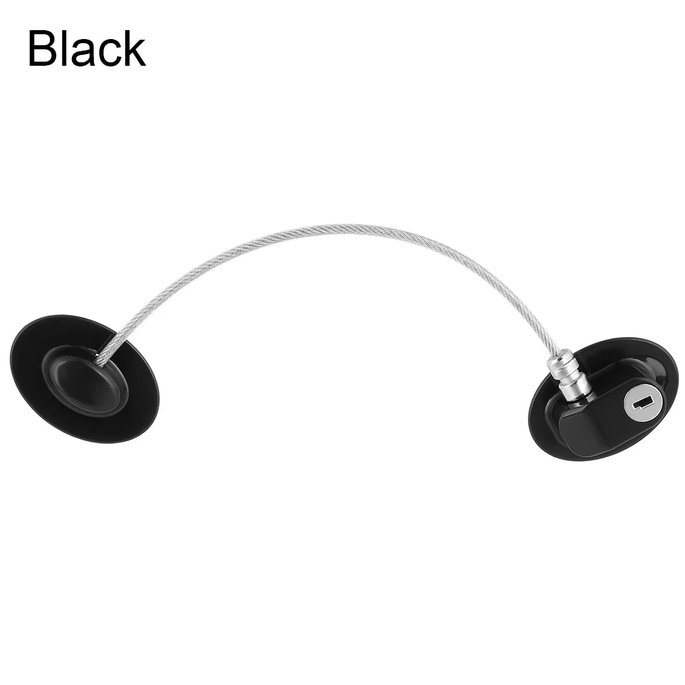 A black child safety cabinet lock with a key or digital code, shown against a white background.