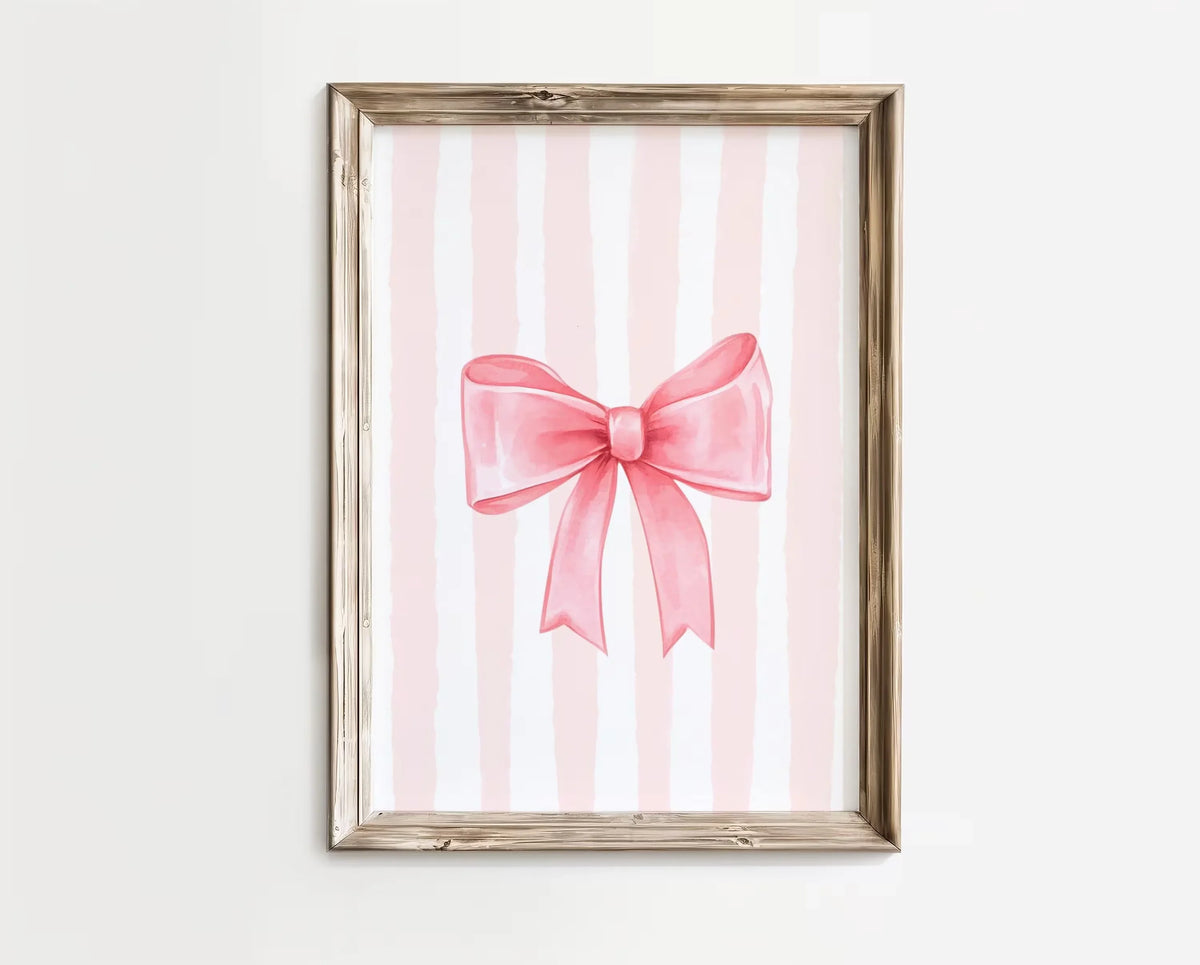 Pink bow canvas print featuring vertical stripes in soft pink and white on a light wood frame.