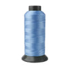 A spool of light blue heavy-duty nylon sewing thread for upholstery and denim.