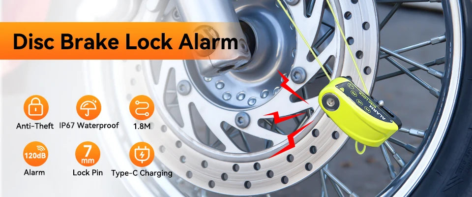 Yellow disc brake lock alarm device attached to a motorcycle wheel, highlighting anti-theft features.