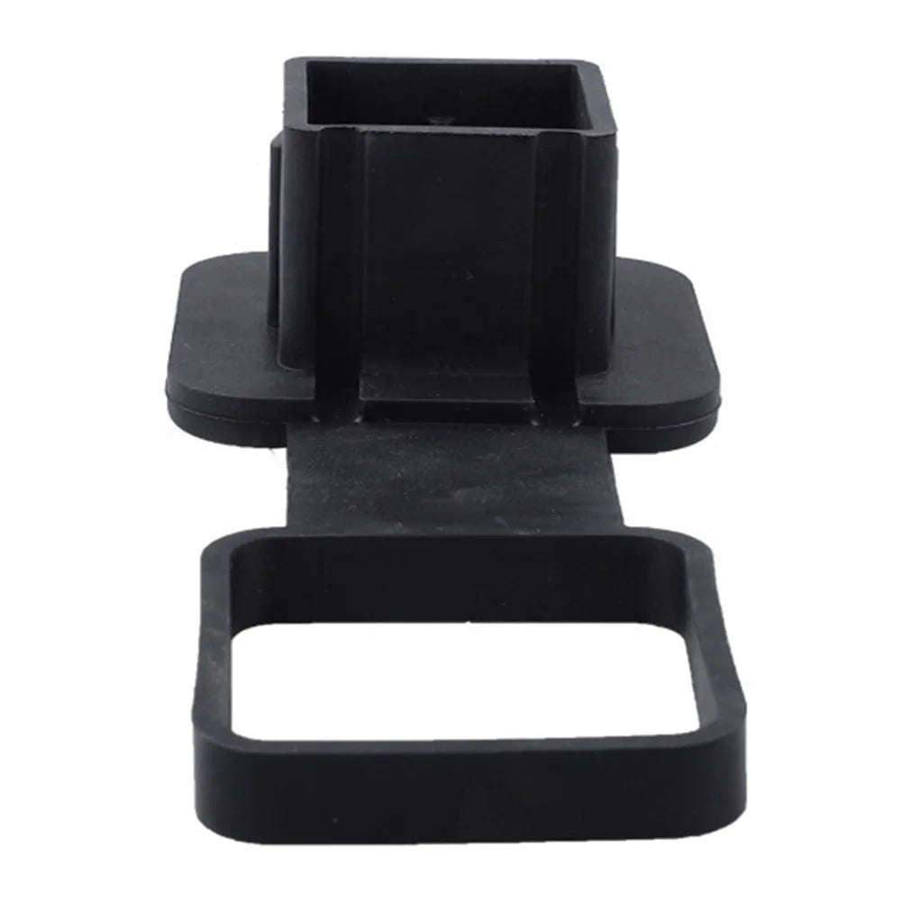 Black trailer hitch receiver cover with a flag emblem.