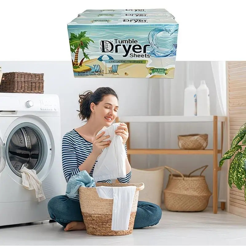 A woman is sitting in front of a washing machine with a box of Tumble Dryer Sheets visible.