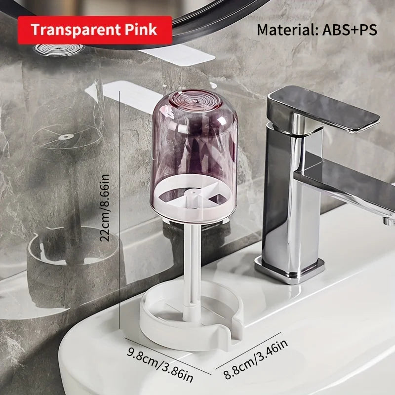 Organizadora de tocador de baño rosa transparente montada en la pared con grifo y dispensador de jabón cromado.
