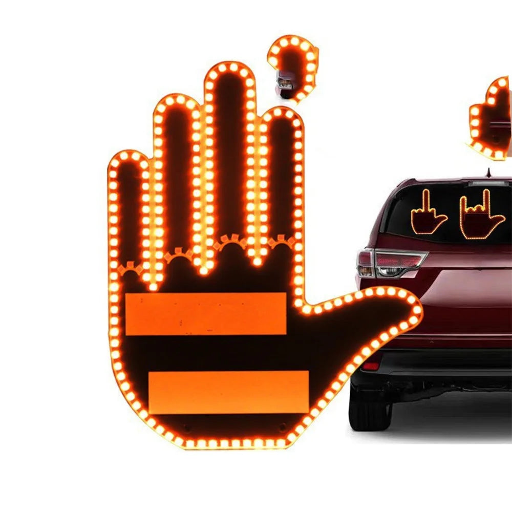 An orange LED hand light illuminates a car, showing a middle finger gesture.