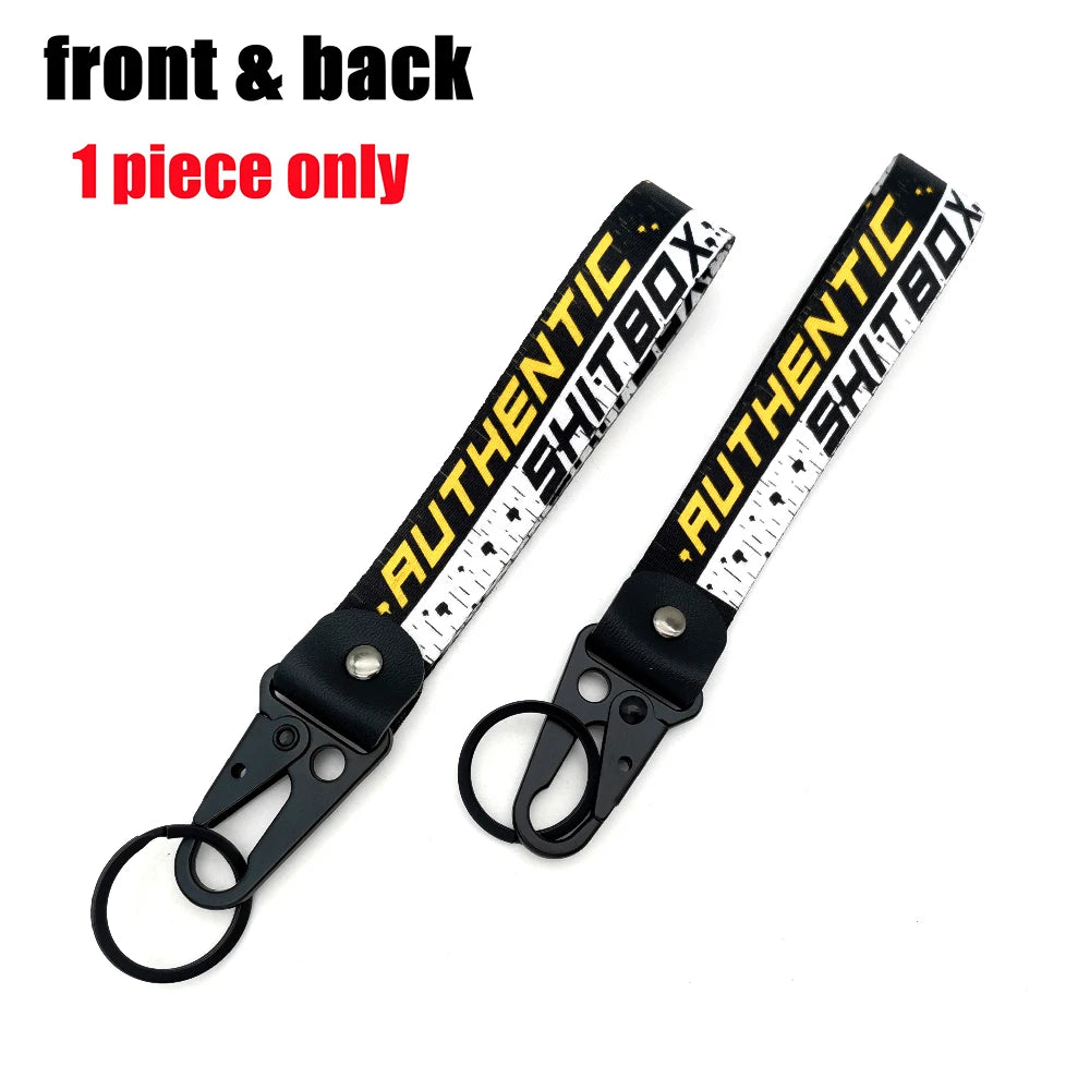 Front and back view of a 1 piece JDM style anime girl keychain with a steel clip.