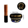 Handcrafted Tibetan singing bowl with a wooden striker and blue cushion