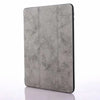 A gray Retro Marble iPad Pro 12.9 case with a built-in pencil holder.