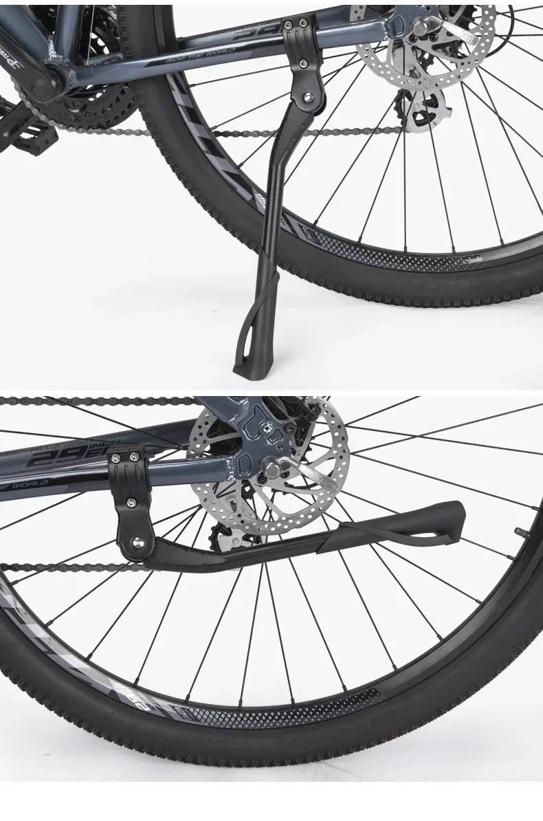Close-up view of a black universal aluminum alloy bicycle kickstand attached to a bike wheel.