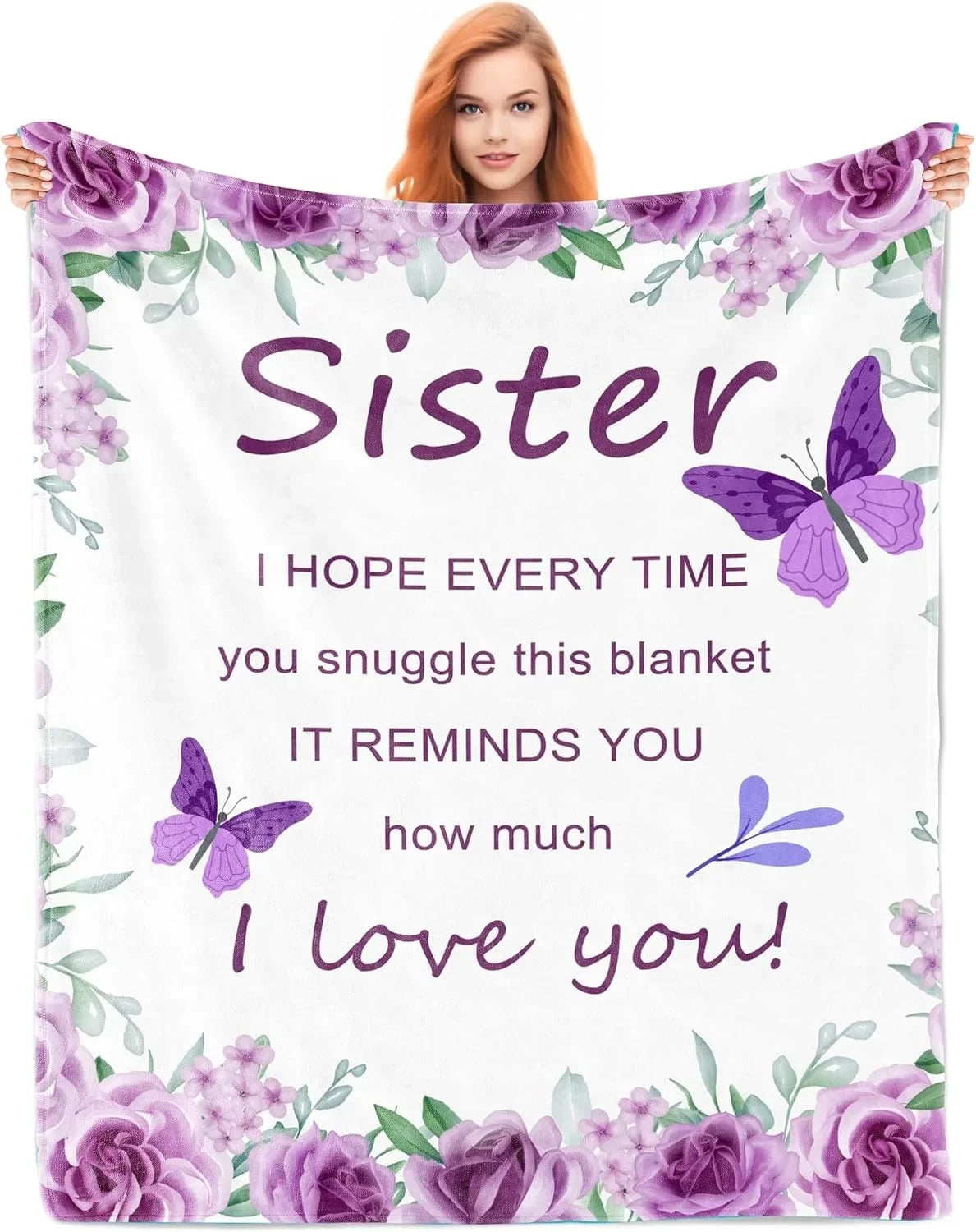 A woman smiles while holding a purple floral fleece throw blanket with the text Sister I hope every time you snuggle this bla