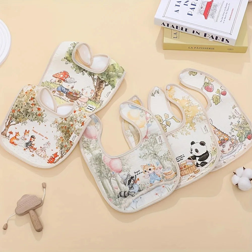 A set of soft cotton waterproof baby bibs featuring various cute animal and nature patterns.