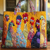 A yellow quilted tote bag featuring colorful painted designs of peacock heads.