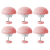 Six pink non-slip duvet cover clips shown in various angles and close-ups.